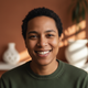 Portrait of a smiling person, conveying trust and satisfaction.